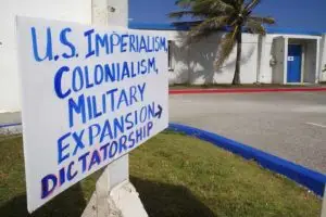 Protest Sign. Fanai Castro image.
