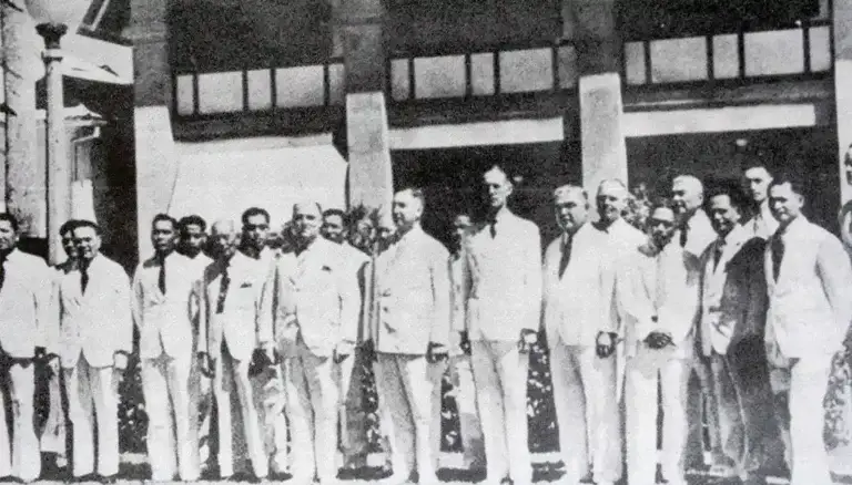 The Island Court, including judges and appeals court staff, pose with Governor George J. McMillin (1940-1941). Photo from the Sanchez collection courtesy of Don Farrell.