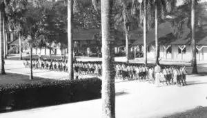 School children drill in front of Dorn Hall each morning. Ekelund collection from the Guam Museum.