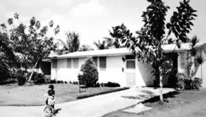 Typhoon Karen in 1962 destroyed many homes. Private developers brought in a pillbox style Kaiser Pre-Fab houses which dominated Guam's housing scene for many years. Jack Jones.