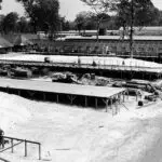 Men of the 854th Aviation Engineers erect quonset huts to be used as hospital wards at North Field, Guam January 1945.