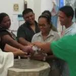 Baotismo of Royce Surigao, 2008. He is held by his parents, Joelyn Sanchez and Roy Surigao, and his four godparents. Godparents are chosen from family or close friends. Surigao family collection.