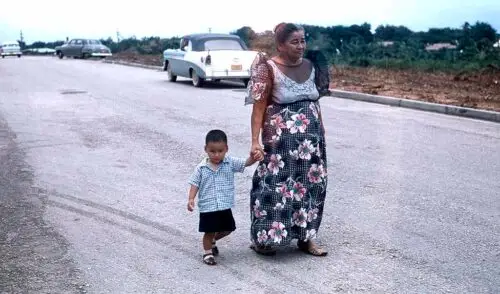 woman-boy walking - Guampedia