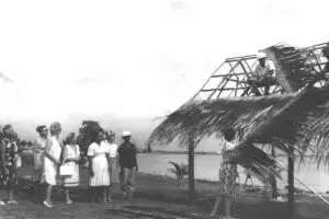 Guam Women's Club members visit an East Agana site where cultural huts are being built for public use. The club was responsible for several civic improvements on Guam.