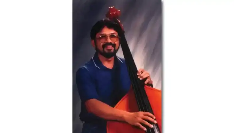 Carlos T. Laguana, following in the footsteps of his father, Carlos C. Laguana, became a bassist. Laguana studied the bass at Berkeley College of Music in Boston and has been teaching band. Telophoto/Guam Humanities Council