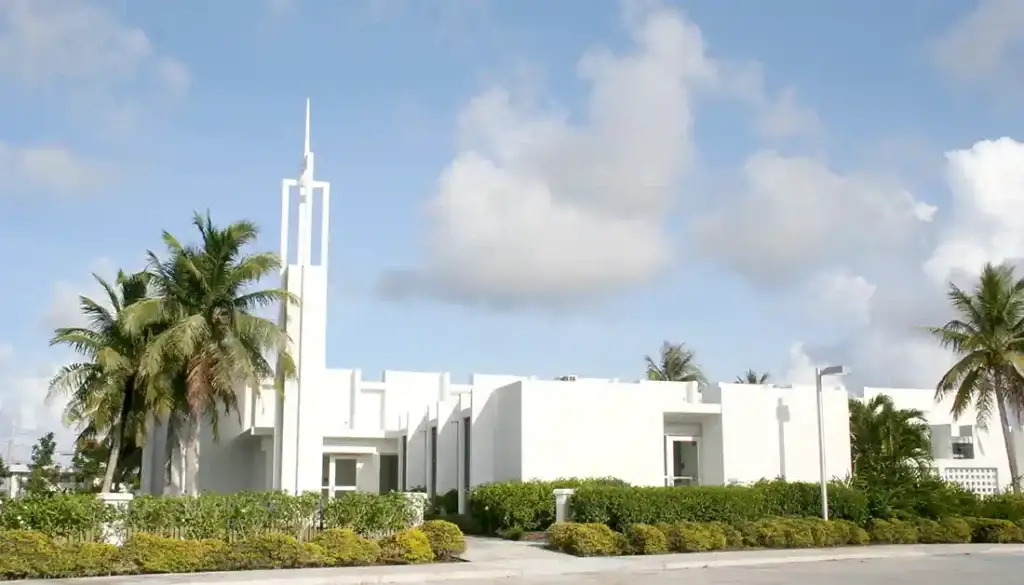 The first Mormons on Guam, in 1950, were in the military. They began meeting in rented space and an old navy chapel of quonset huts until they built a church in Barrigada. Sheila Tyquiengco photo for Guampedia.