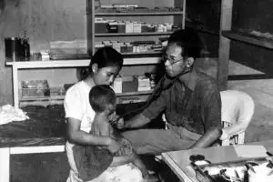 Dr. Sablan at Work. Dr. Anne Hattori collection.