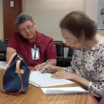 War Survivor Maria Pablo receives her reparations check at the Governor’s Complex at Adelup on February 28, 2020. Eric Vincent Thomas/Guampedia.