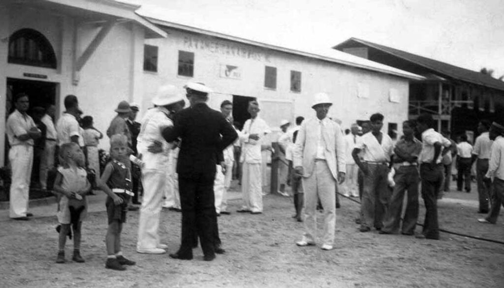 The Pan American flight crew are greeted at the Pan American Hotel by military personnel, 1935. R.O.D. Sullivan/Pan American Historical Foundation