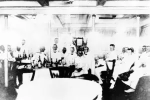 Officers in dining room the SMS Cormoran. Photo from the Herbert T. Ward collection courtesy of the Micronesian Area Research Center (MARC).