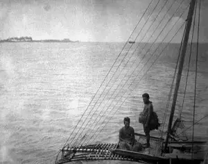 Marshall Group, Jaliut Lagoon, crew of sailing canoe in native costume. Photo from the Wikimedia Commons courtesy of NOAA.