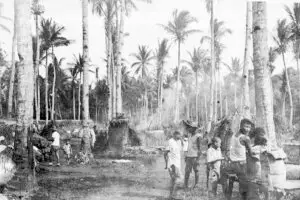 In a rare photo of Manenggon in 1994, people are shown milling about the camp. The hardships of war and the occupation only served to intensify Guamanians' desire for a better future and for control of their own destiny. Photo courtesy of the Micronesian Area Research Center (MARC).