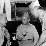 Secretary of the Navy Forrestal, Fleet Admiral Nimitz, and other Senior Military Officers