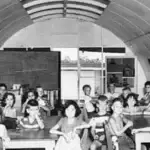 Mrs. Robinson's Second Grade Class. Adelup School, Guam, 1951. James M. Stewart's daughter, Alice, is seated up front second from the right. Manuscripts Collection RFT MARC, University of Guam.
