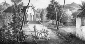 The Society of Jesus, or the Jesuits, first brought the Catholic faith to Guam in 1668. The Humåtak/Umatac church from d'Urville's Voyage de la corvettte L'Astrolabe, 1830.