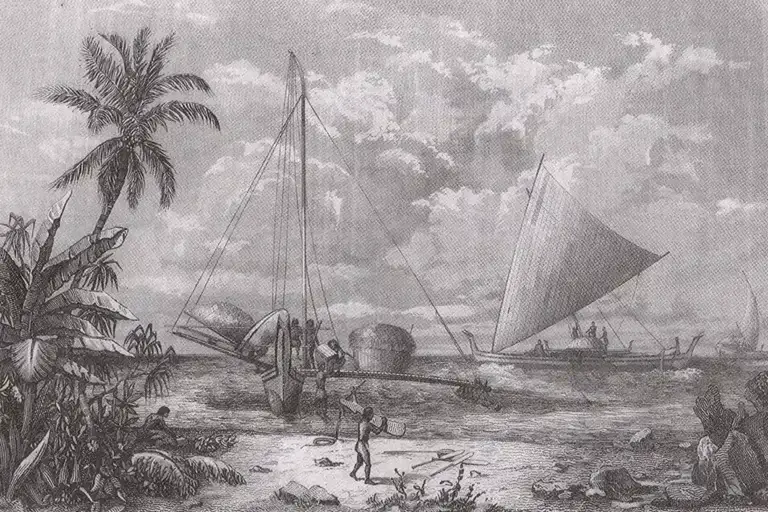 Historical engraving of a tropical shoreline with palm trees, sails, and ships at a beach. It shows people working by the water.
