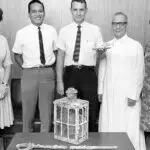 Ward and Micronesian Area Research Center (MARC), University of Guam. Form left to right: Marjorie Driver, Acting Director of MARC, UOG President Antonio C. Yamashita, Herbert T. Ward (Diver and author), Msgr. Oscar L. Calvo, and Emilie Johnston
