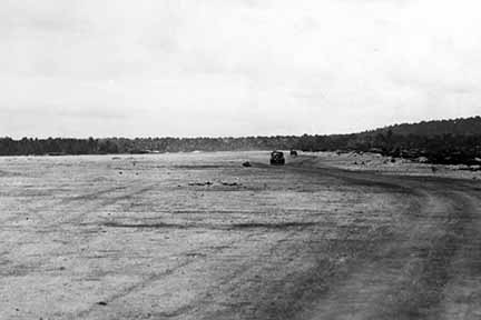 August 12, 1944. Airstrip (Tiyan) built by the Japanese about three miles northwest of Hagåtña/Agana. USS Indianapolis (CA 35). National Archives 80-G-248089